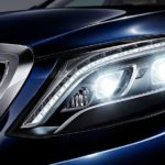 What are the legal standards for headlamps and how strong may they be?